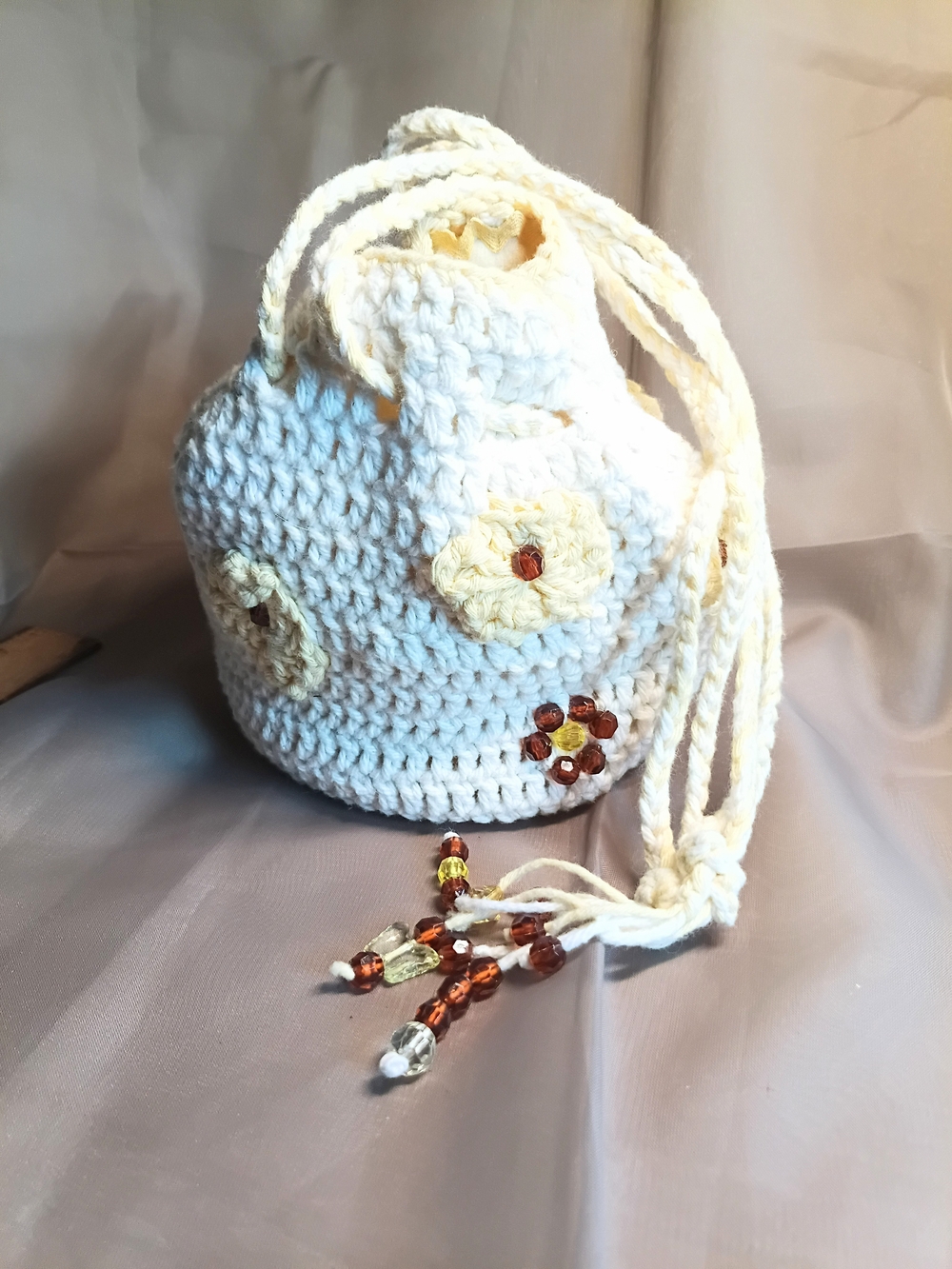 Handmade Crochet Mini Drawstring Bag in Off-White with Floral Accents